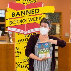 Jennie Samons with Banned Books Week banner